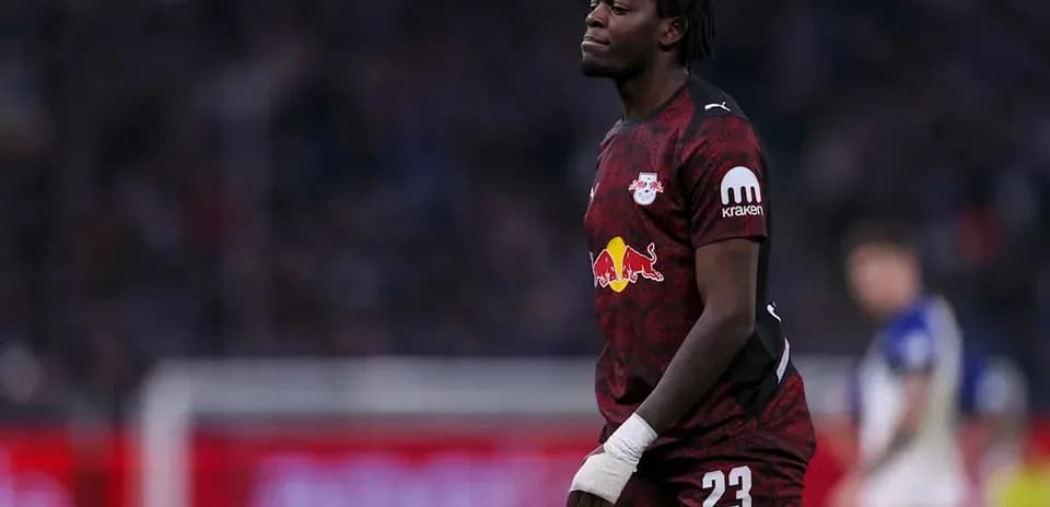 Goalkeeper in red jersey during match