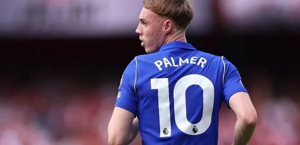 Player in blue jersey with number 10 and name Palmer