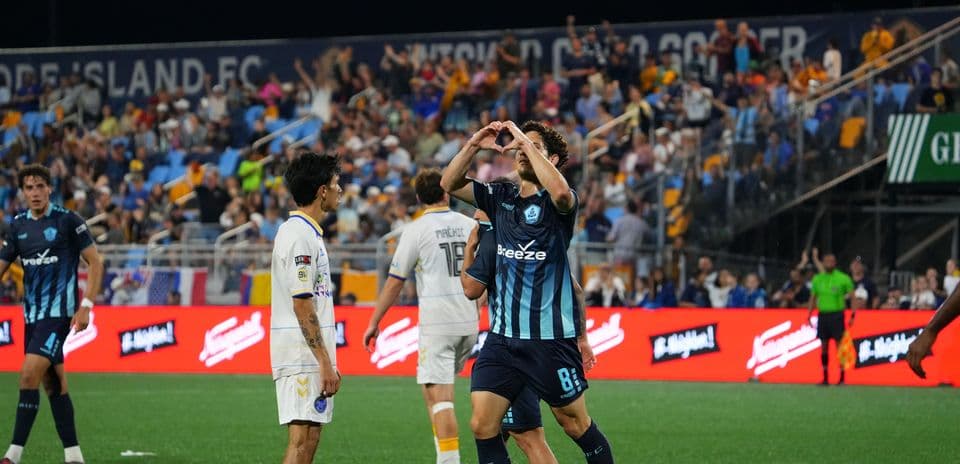 Player celebrating after scoring during match
