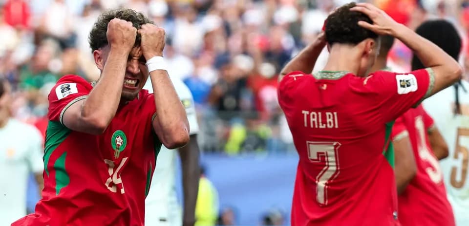 Morocco players reacting after a missed opportunity