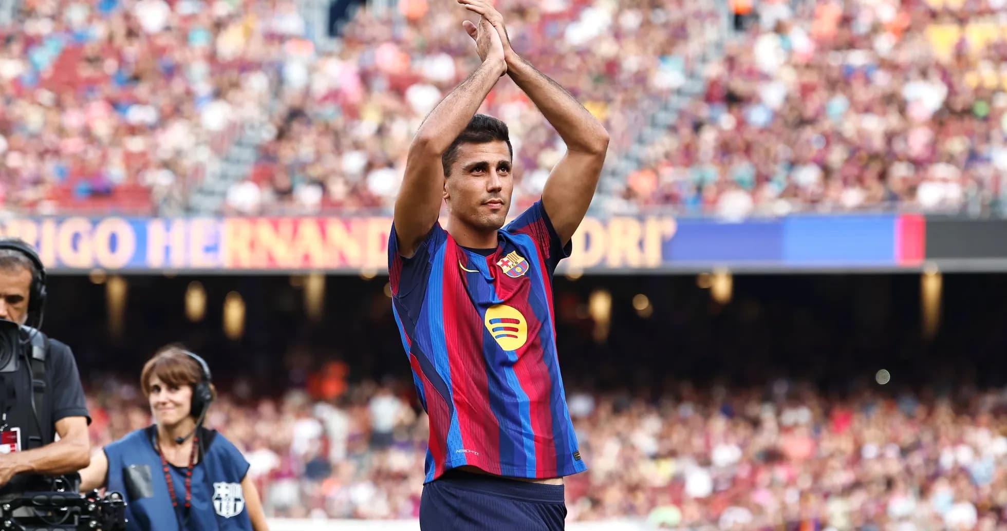 Player applauding fans during match at Camp Nou
