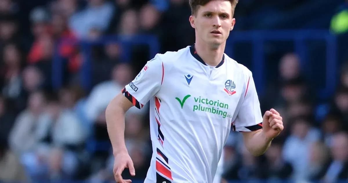 Bolton Wanderers player running during match