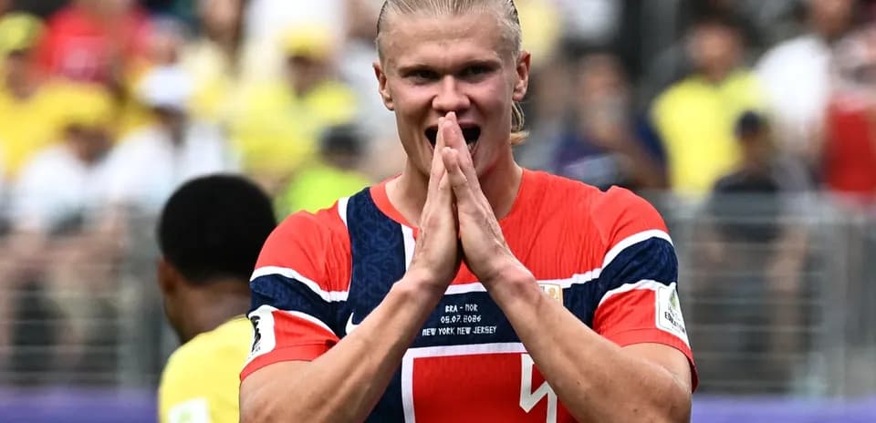 Player celebrating during match with clasped hands