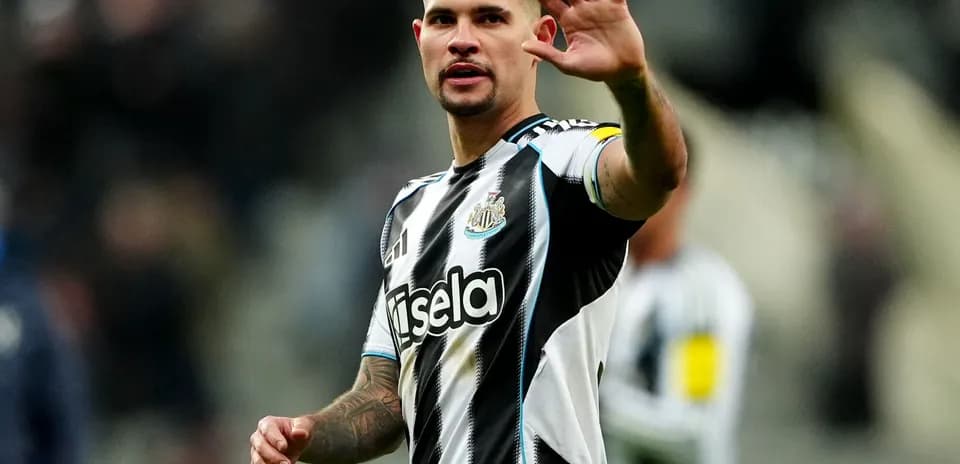 Player waving to fans during a match