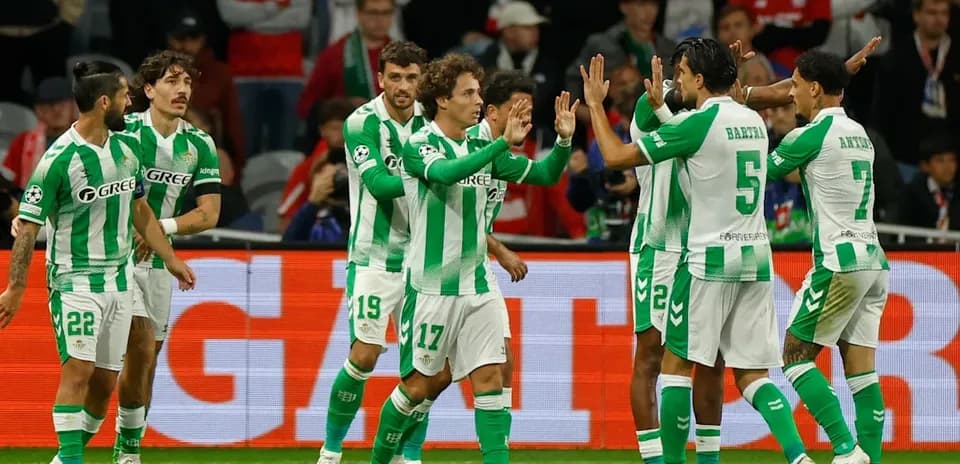 Real Betis players celebrating a goal on the pitch