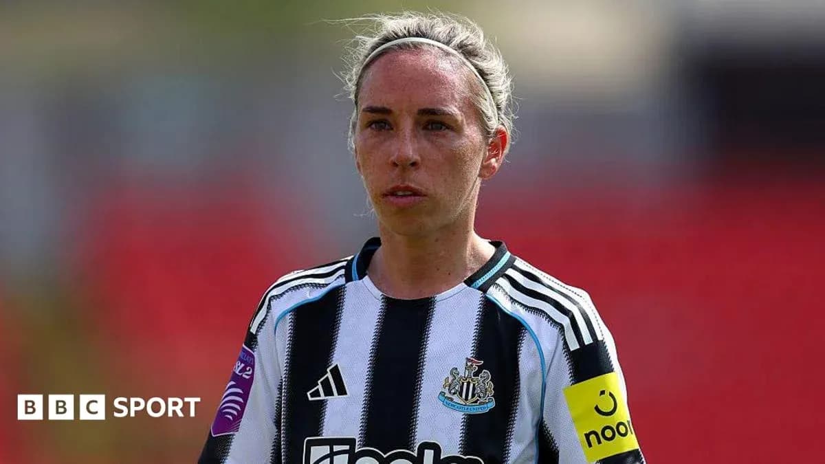 Newcastle player wearing team jersey on the pitch