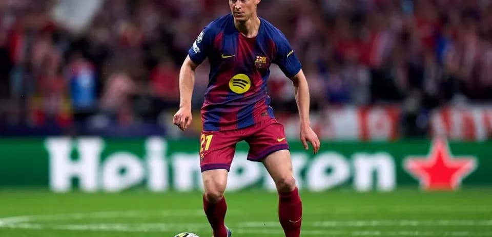 Player in Barcelona kit dribbling ball during match