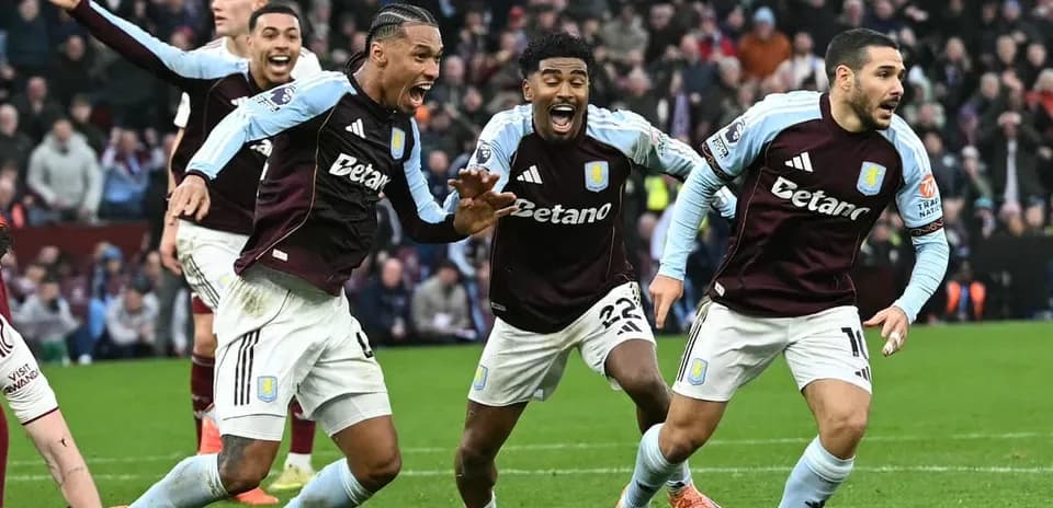 Aston Villa players celebrating a goal during match