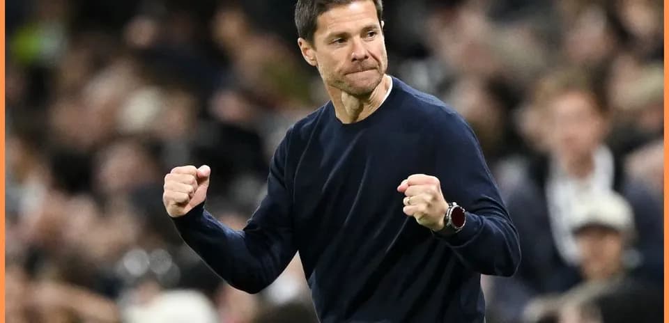 Coach celebrating a goal during a match