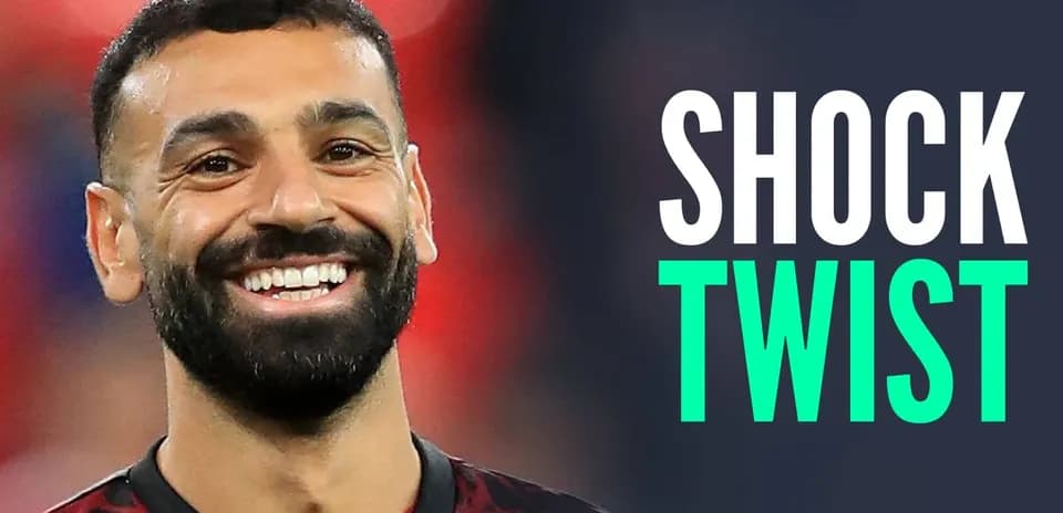 Smiling player in a red and black jersey