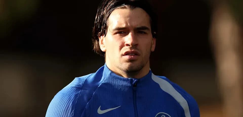 Player in blue training kit during training session
