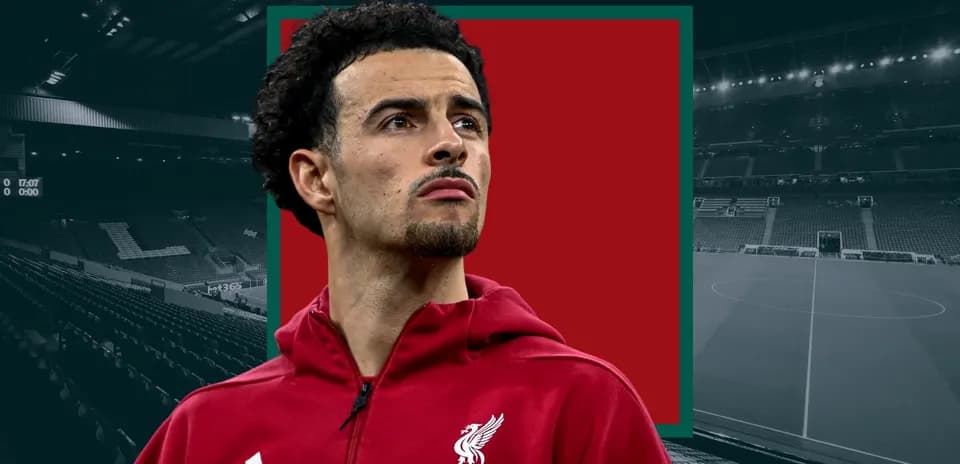 Player in Liverpool kit at Anfield stadium