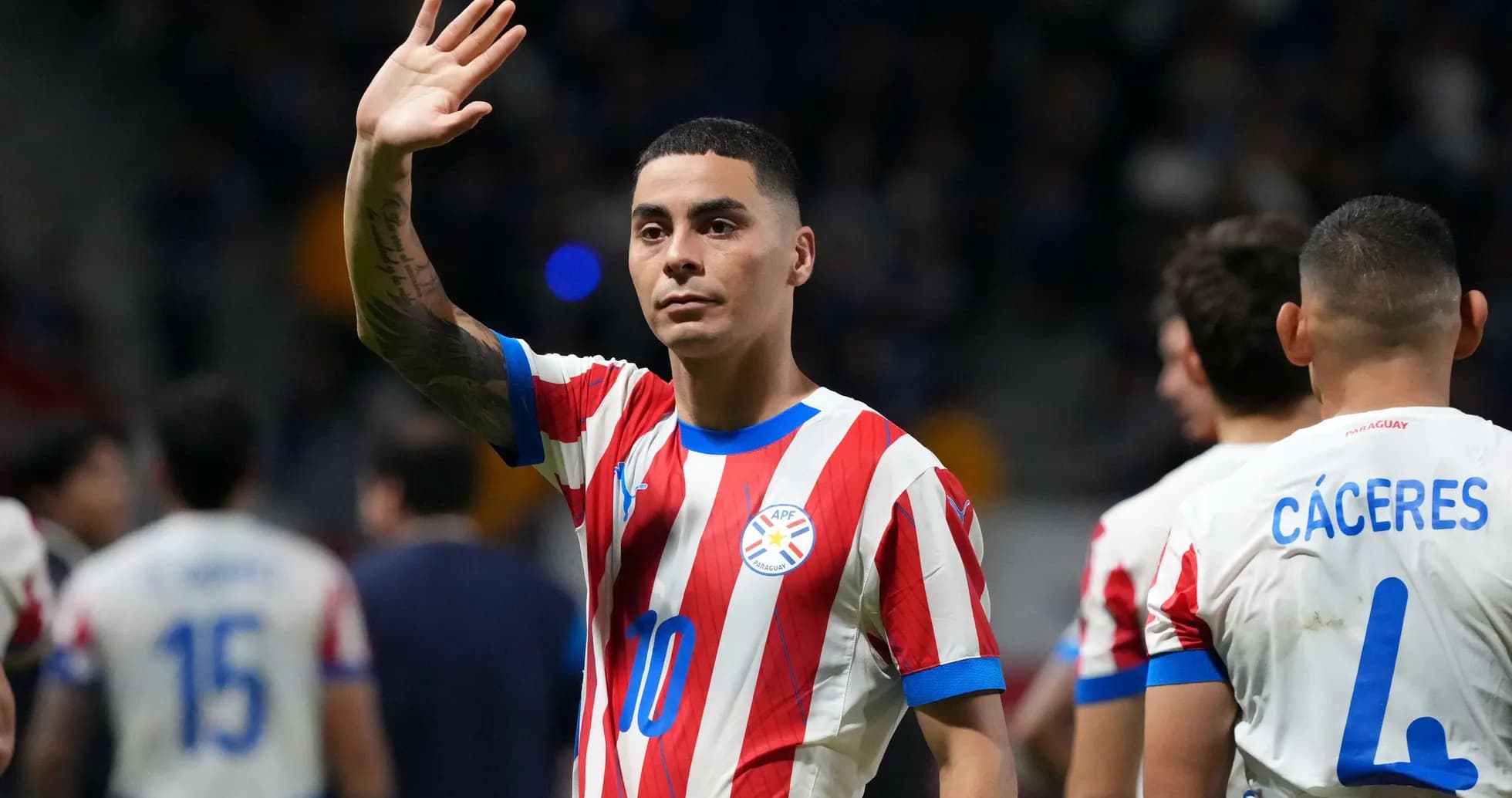 Paraguayan player waving during match