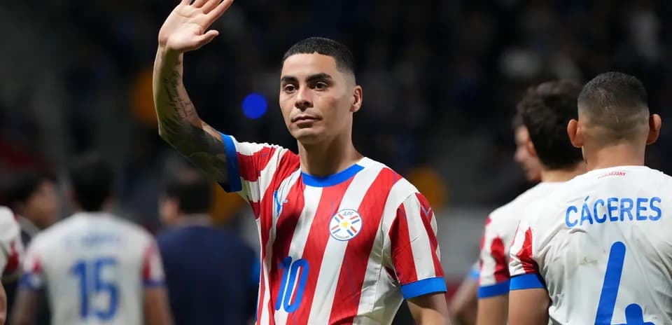 Paraguayan player waving during match