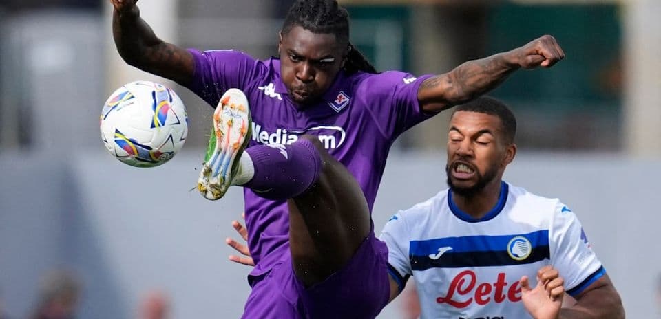 Fiorentina player kicking ball during match