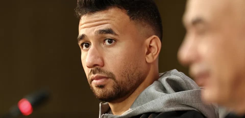 Player at press conference with microphone in foreground