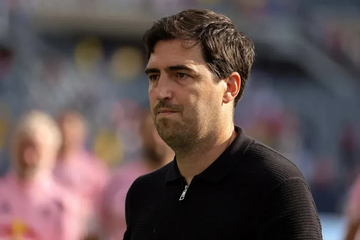 Coach observing the match before kickoff