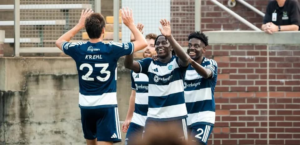 Chattanooga players celebrating a goal