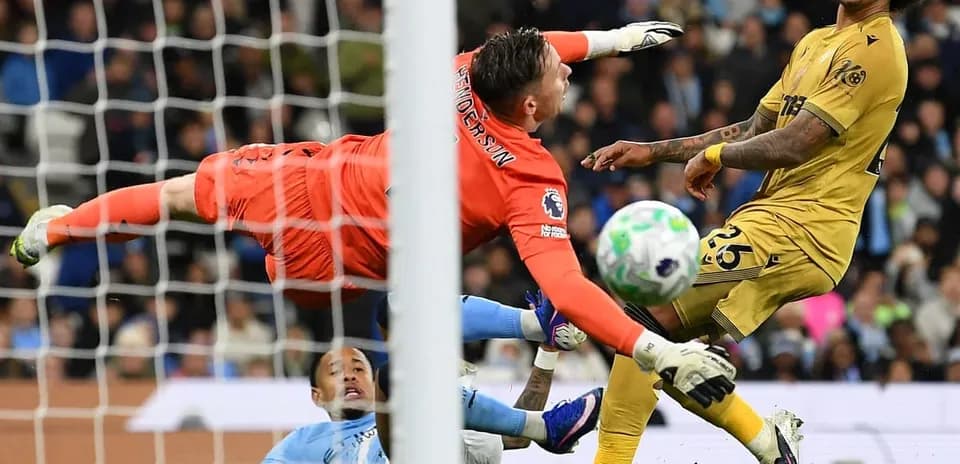 Goalkeeper diving to save during match