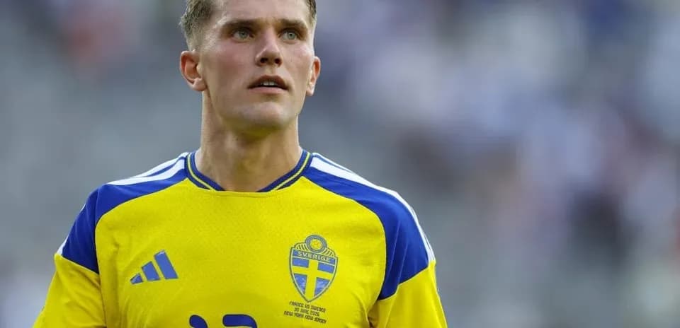 Player in yellow Sweden jersey during match