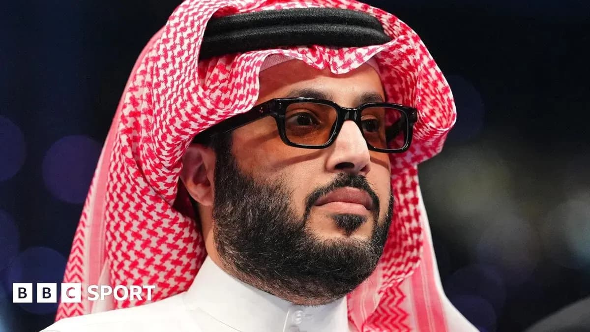 Man in traditional attire at sporting event