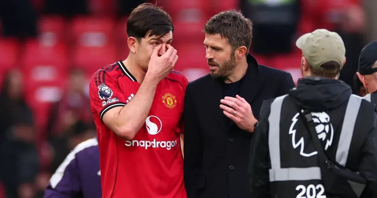Harry Maguire talking to Michael Carrick after match