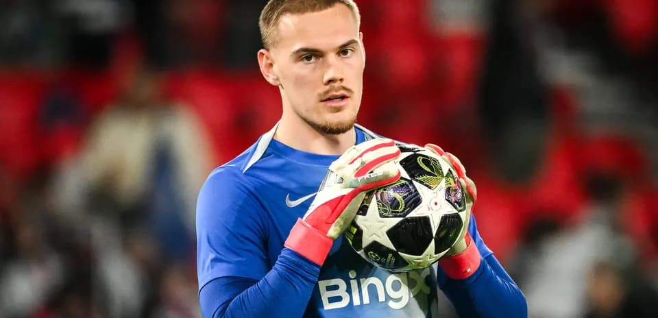 Goalkeeper holding a ball before the match