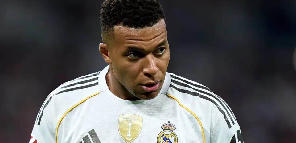 Player wearing Real Madrid jersey on the field