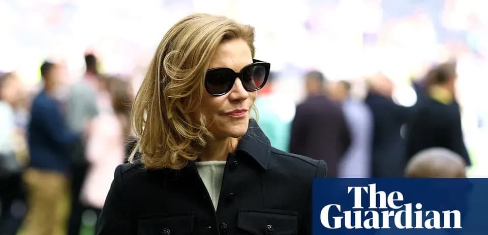 Woman wearing sunglasses at a sports event