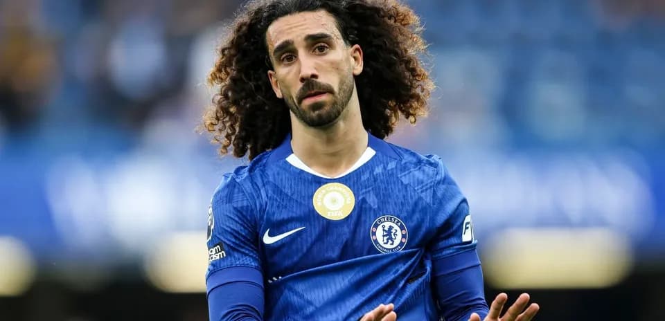 Player in blue Chelsea jersey on the pitch