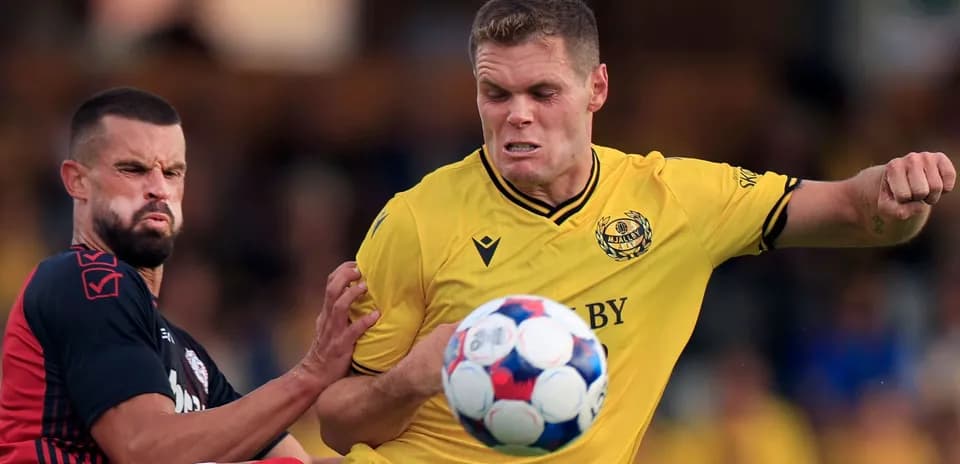 Mjallby player battling for the ball
