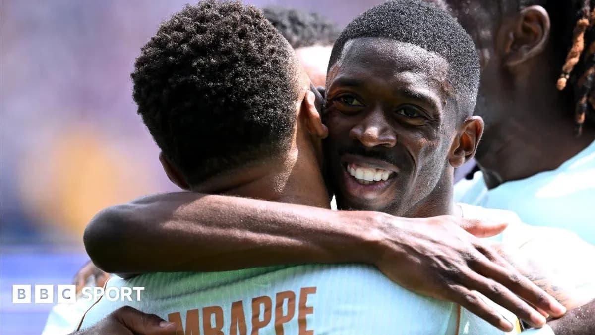 Players embracing after scoring a goal