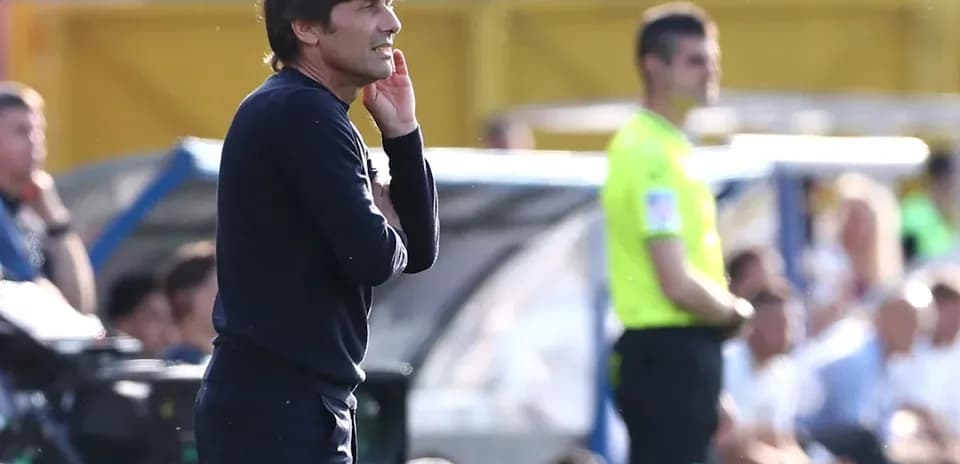 Coach giving instructions during a match