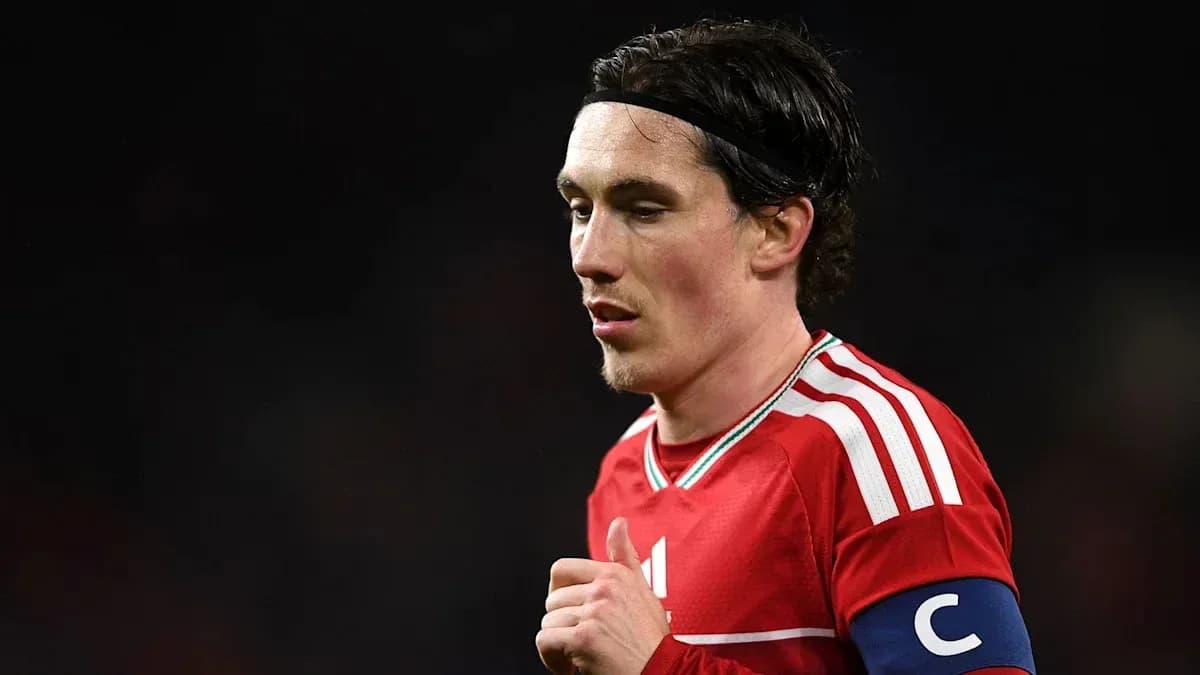 Player in red jersey with captain's armband