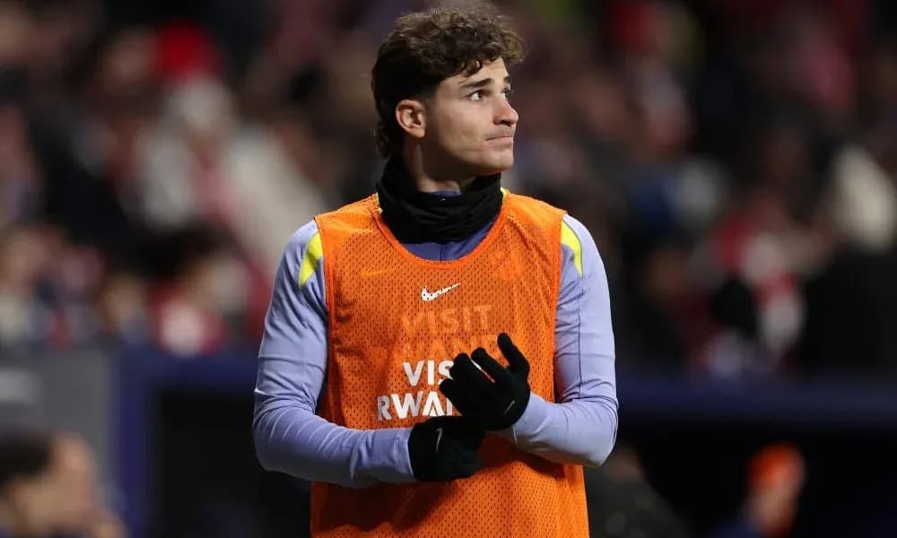 Goalkeeper warming up on the sidelines during match