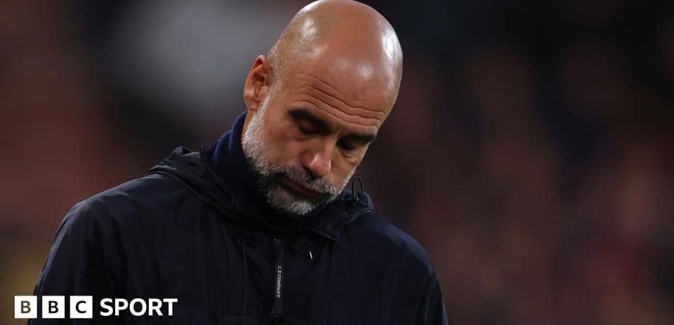Coach looking down during a match