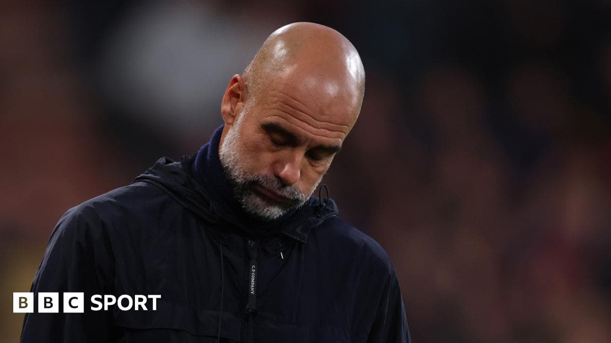 Coach looking down during a match