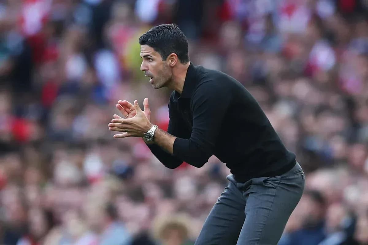 Manager instructing players from the sidelines during match