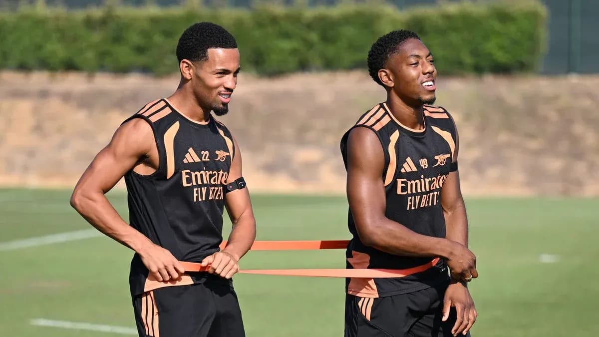 Two players stretching with resistance bands during training