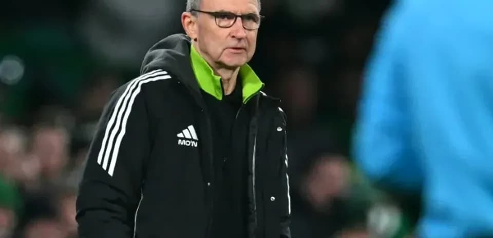 Manager observing match from the sidelines