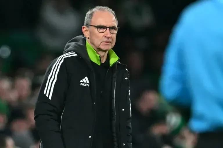 Manager observing match from the sidelines