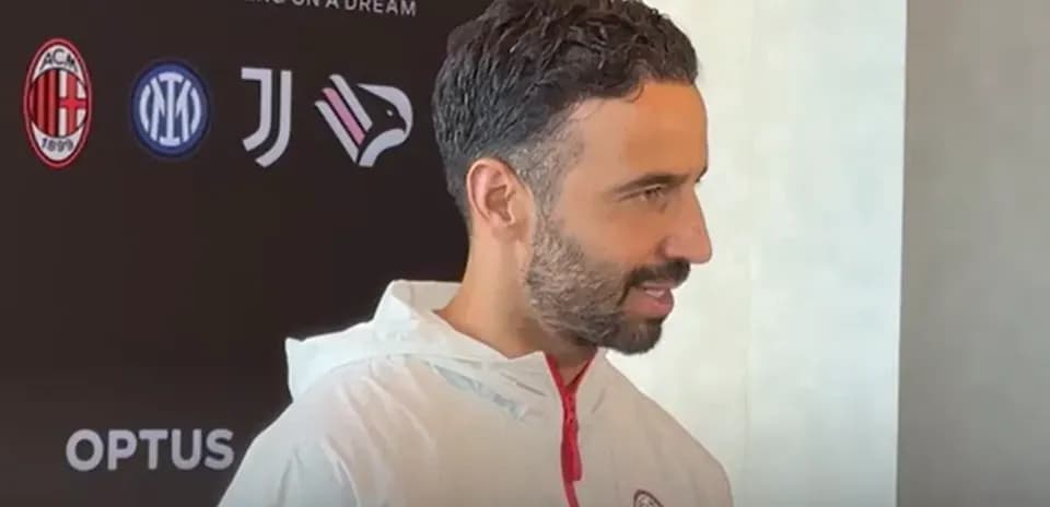 Football player speaking at press conference event