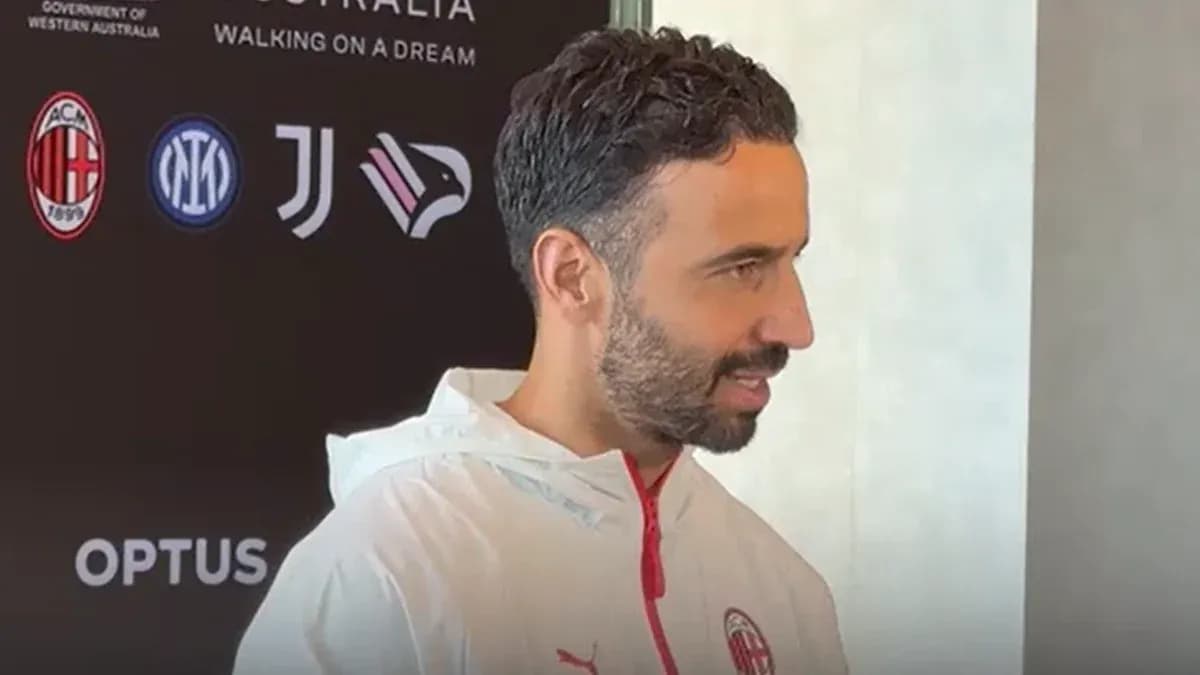 Football player speaking at press conference event