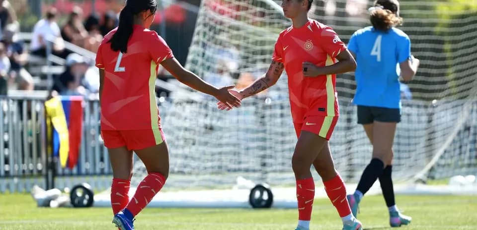 Players celebrating during Portland Thorns match