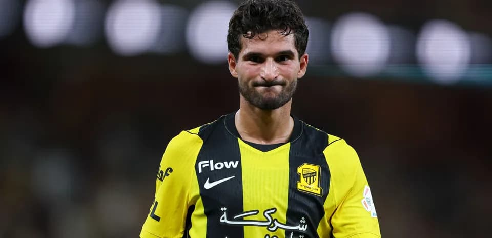Player in yellow and black jersey after match