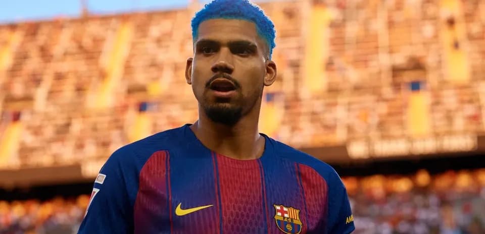 Player with blue hair in Barcelona jersey on field