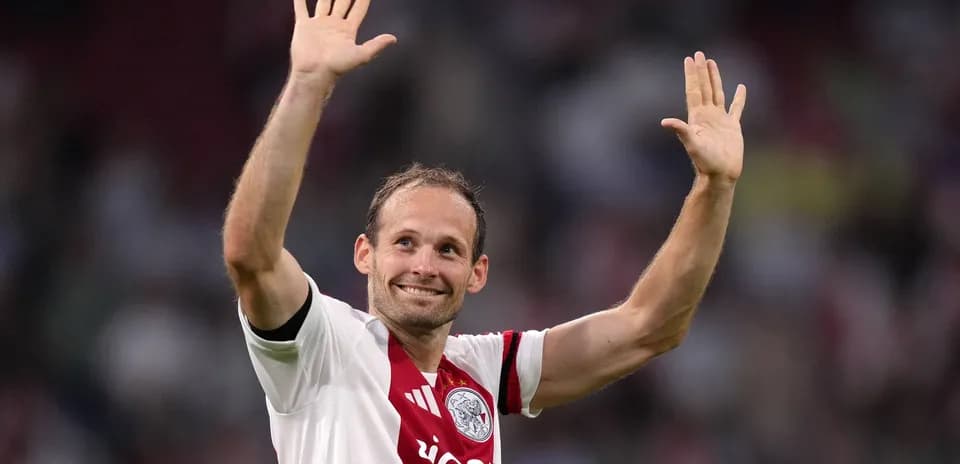 Player waving to fans during a match