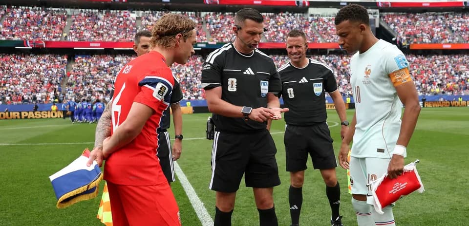 Captains and referees during pre-match coin toss