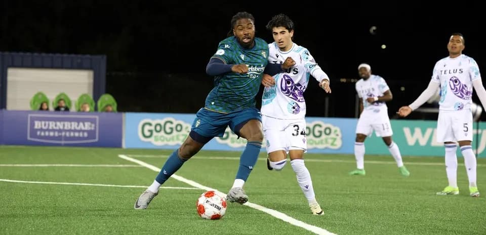 Player dribbling the ball during Vancouver FC match