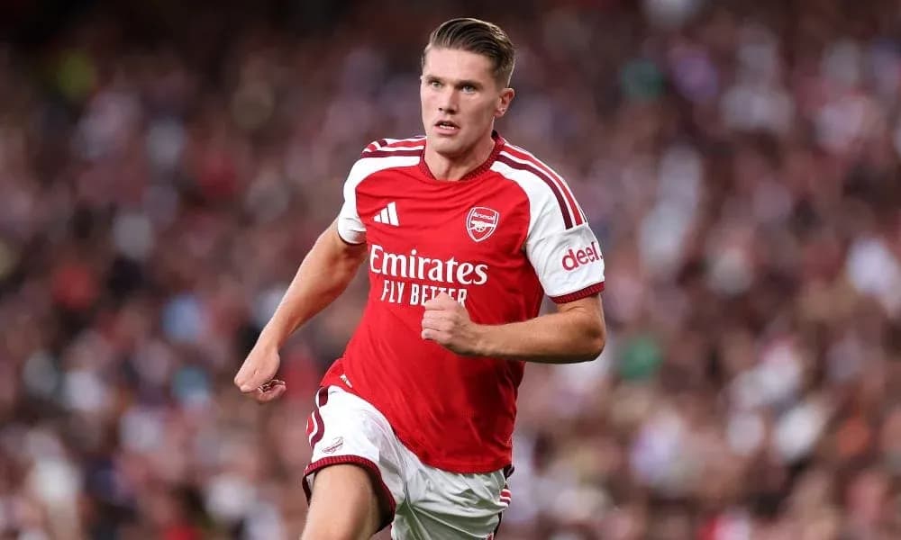 Arsenal player running during match action